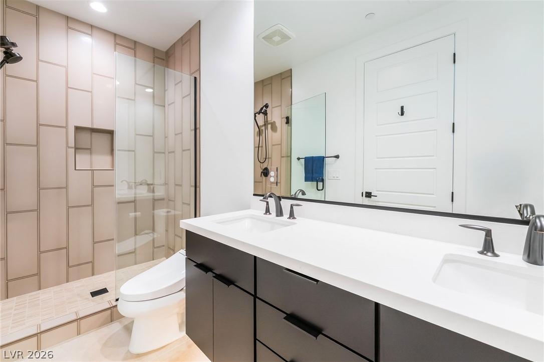 Elegant guest bath with sleek vanity and premium plumbing fixtures