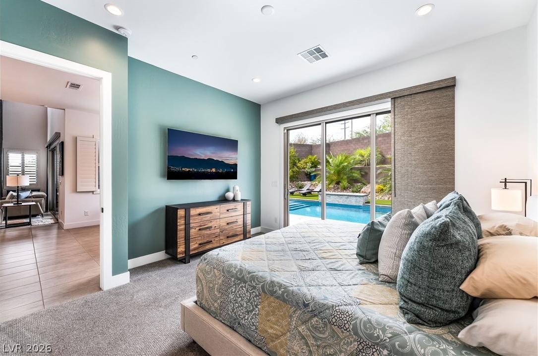 Comfortable fifth bedroom offering ample natural light at 127 Malpaso