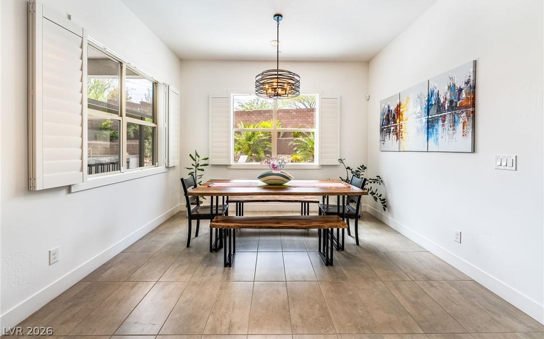 Open-concept dining area adjacent to the gourmet kitchen at 127 Malpaso Street