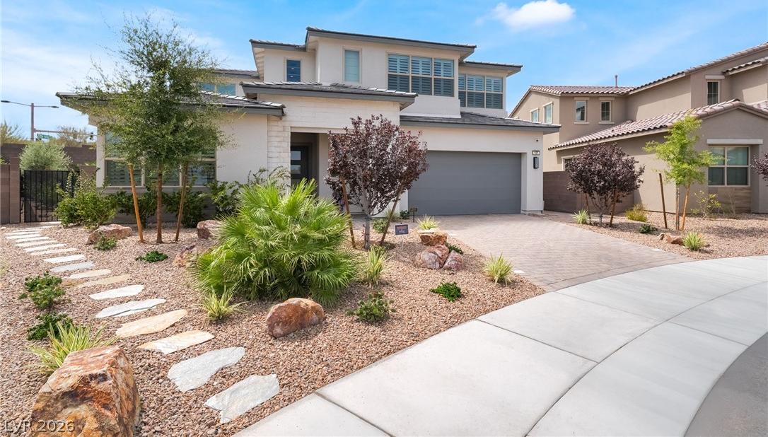 Modern front elevation of 127 Malpaso in gated Acadia Ridge at Summerlin West, Las Vegas