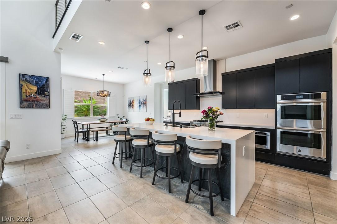 Custom flat-panel cabinetry and generous walk-in pantry at 127 Malpaso
