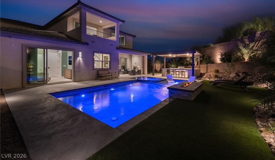 Sunset ambiance in the private resort-style backyard in Summerlin West
