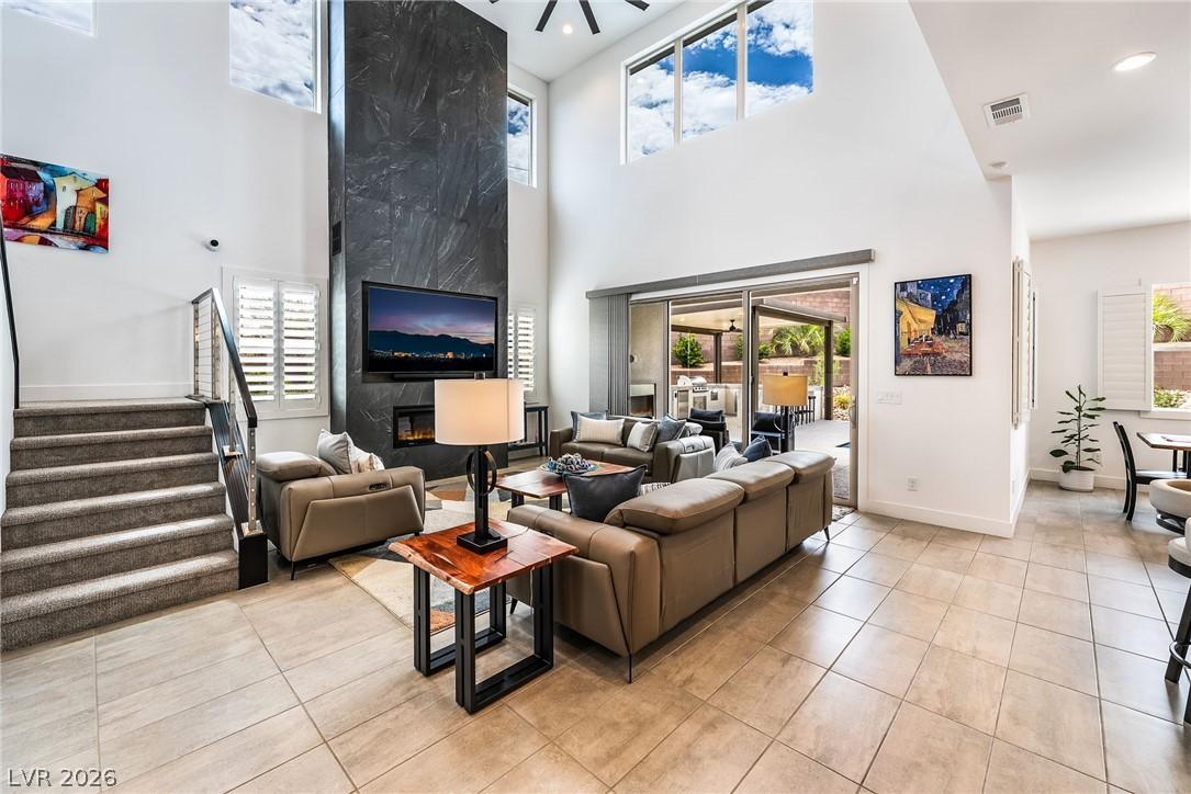 Sunlit open living space accented by bespoke designer lighting at 127 Malpaso